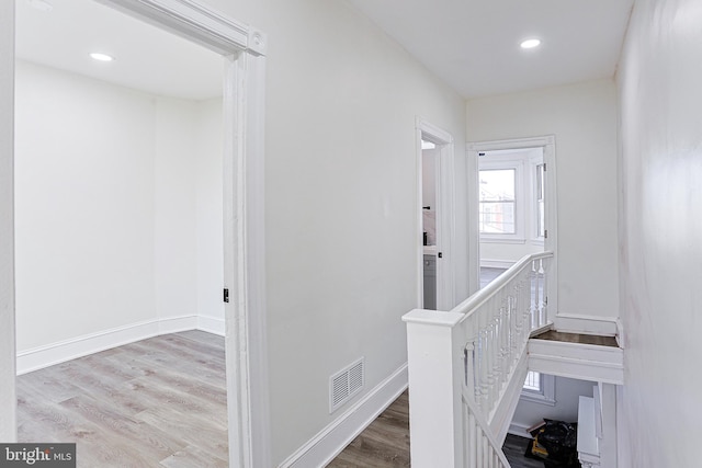 hall featuring light hardwood / wood-style floors