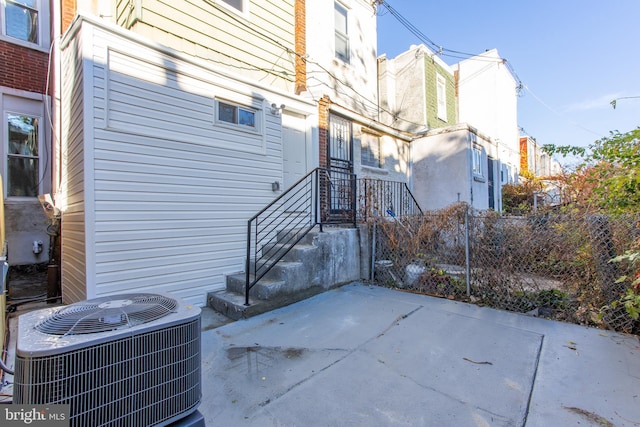 view of patio with central AC