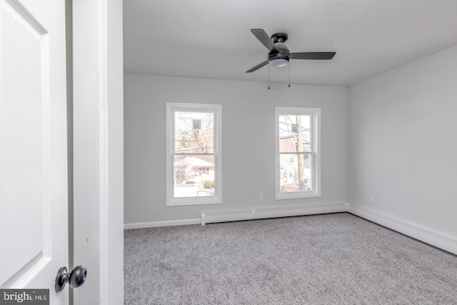 empty room with ceiling fan and light colored carpet