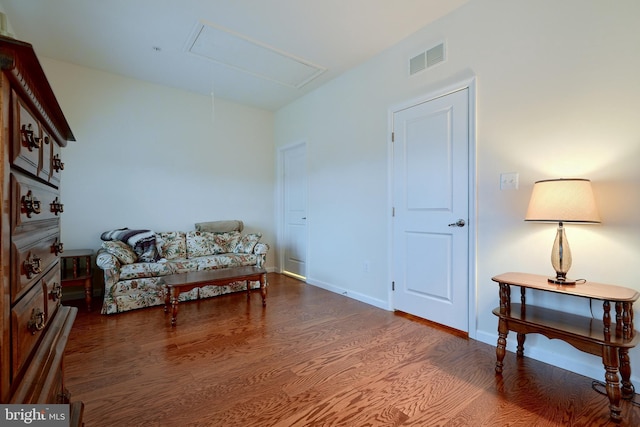 living area with wood-type flooring