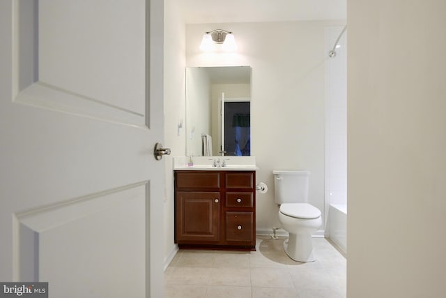 full bathroom featuring tile patterned flooring, bathtub / shower combination, vanity, and toilet