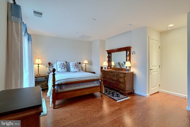 bedroom featuring wood-type flooring