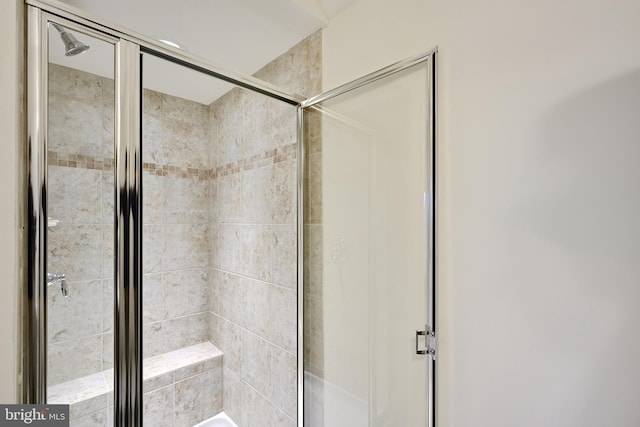 bathroom with an enclosed shower