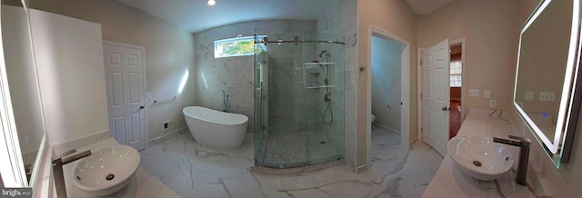 bathroom featuring separate shower and tub and sink