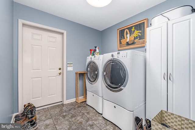 washroom with independent washer and dryer