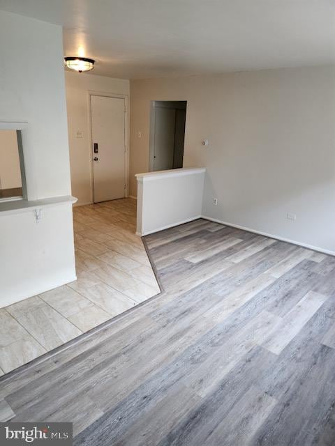 empty room with light wood-type flooring