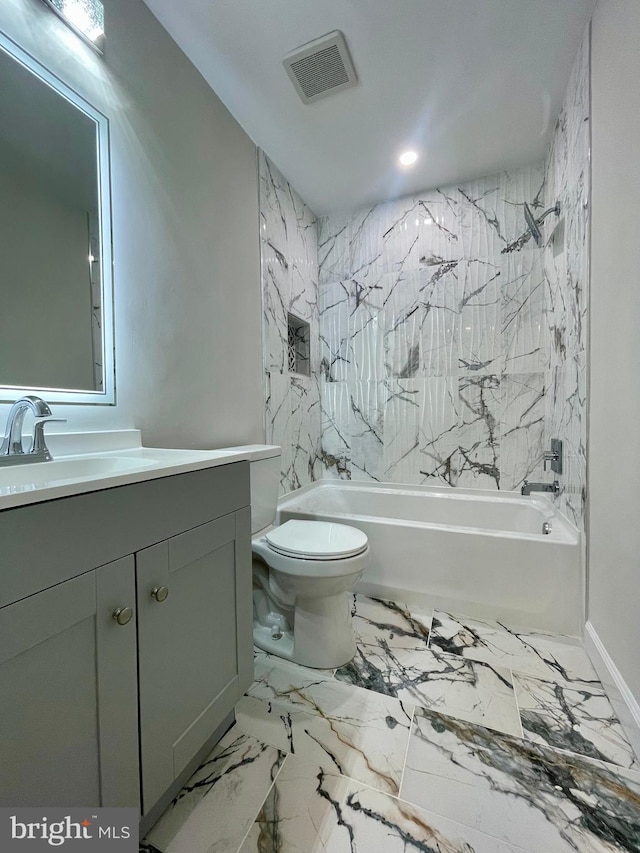 full bathroom featuring shower / tub combination, vanity, and toilet