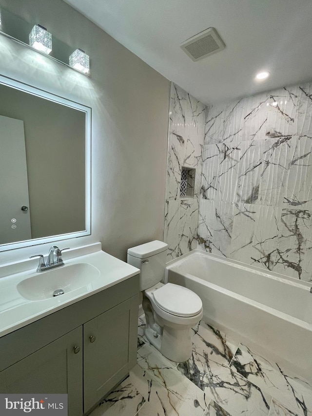 full bathroom featuring vanity, toilet, and shower / bathtub combination