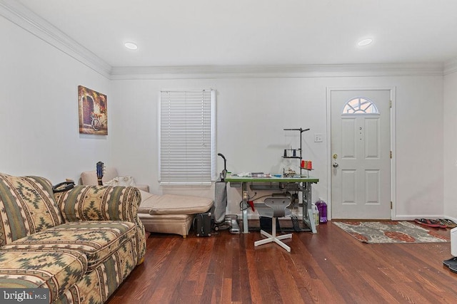 entrance foyer with dark hardwood / wood-style floors and ornamental molding