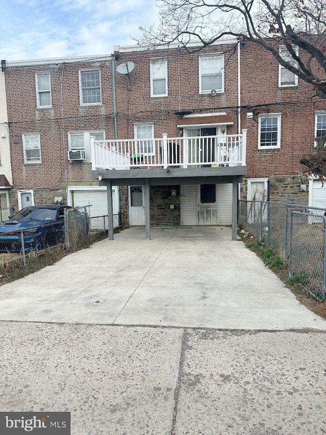 back of house with a wooden deck