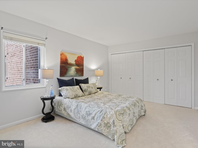 bedroom with a closet and carpet