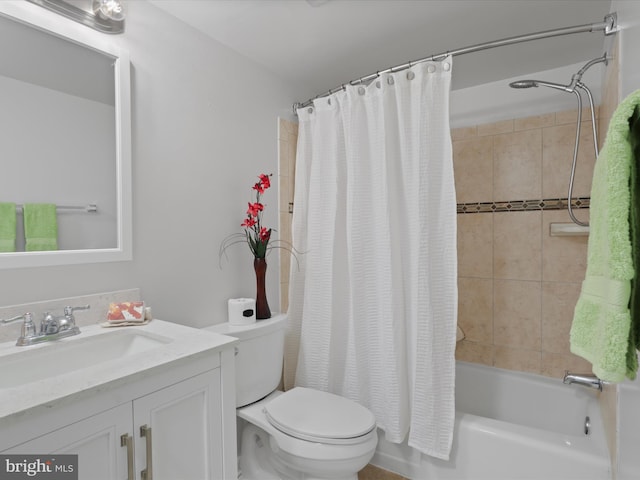 full bathroom with shower / tub combo, vanity, and toilet