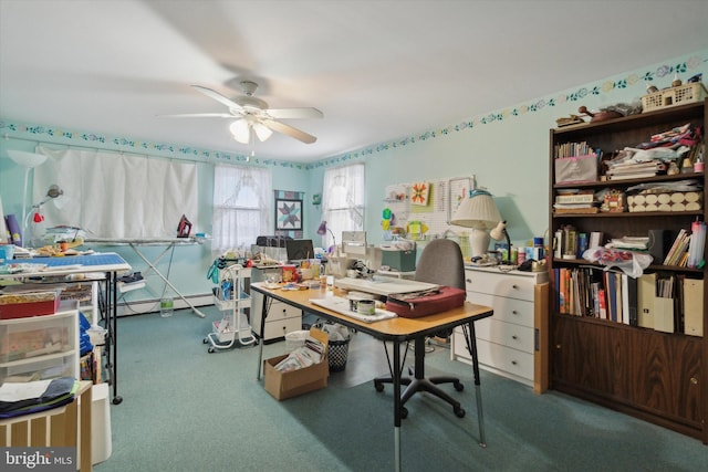 carpeted home office with baseboard heating and ceiling fan