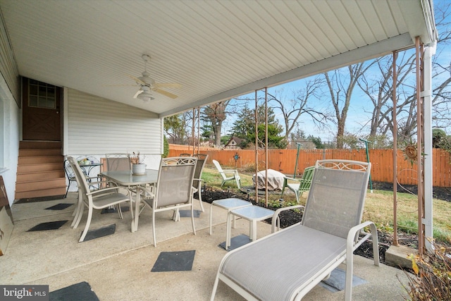 view of patio / terrace featuring ceiling fan