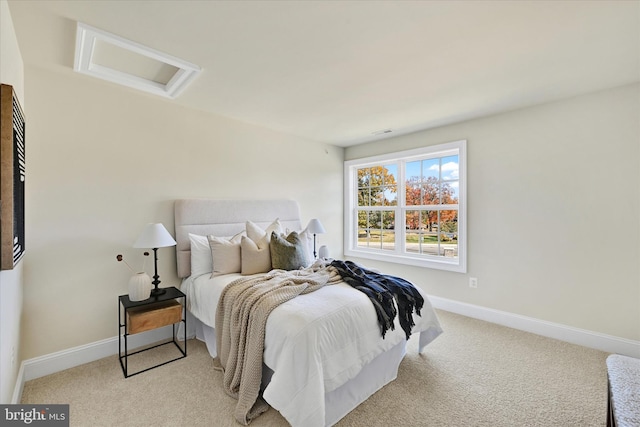 bedroom with light carpet