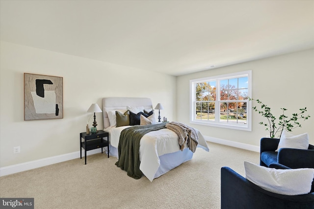 bedroom with light carpet