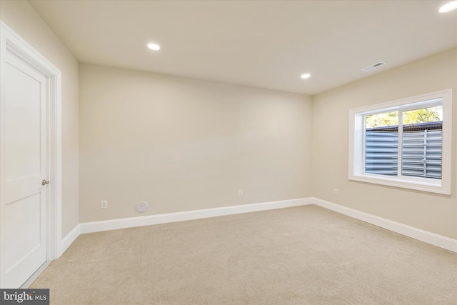 view of carpeted spare room