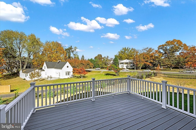 wooden deck with a yard