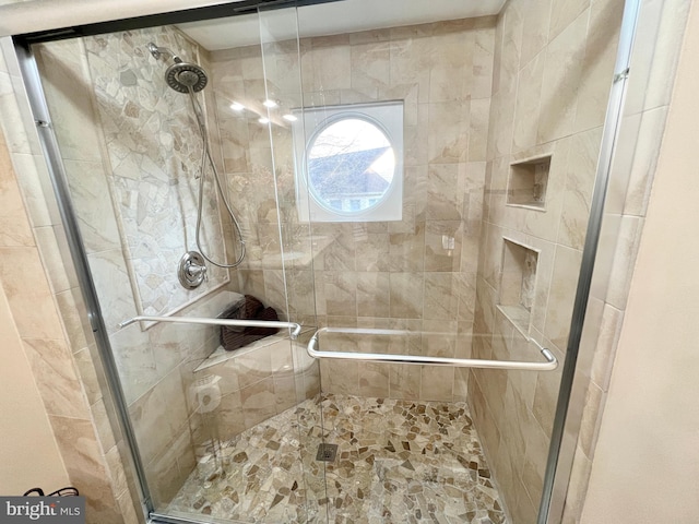 bathroom featuring a stall shower