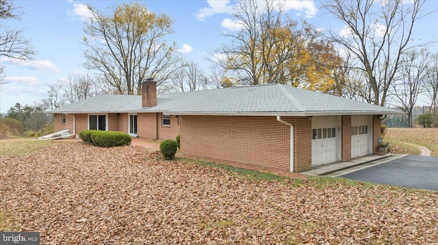 exterior space featuring a garage