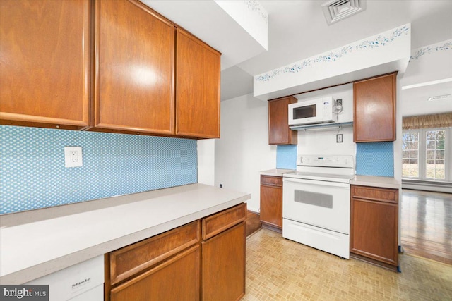 kitchen featuring white appliances