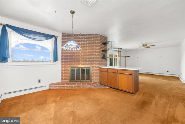 unfurnished living room with a baseboard radiator, a brick fireplace, ceiling fan, and light colored carpet