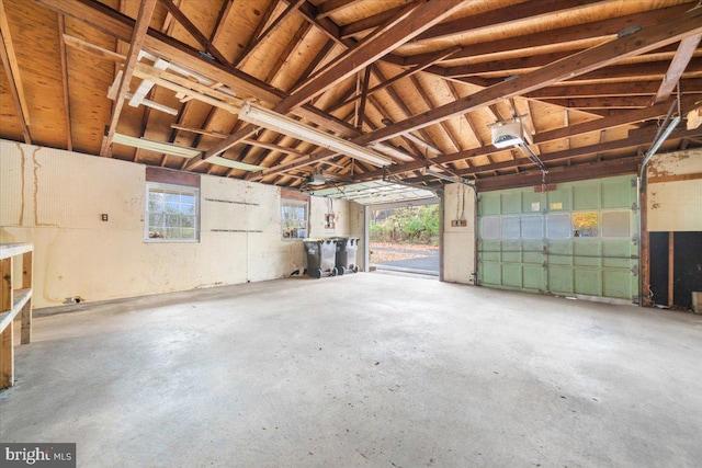 garage featuring a garage door opener