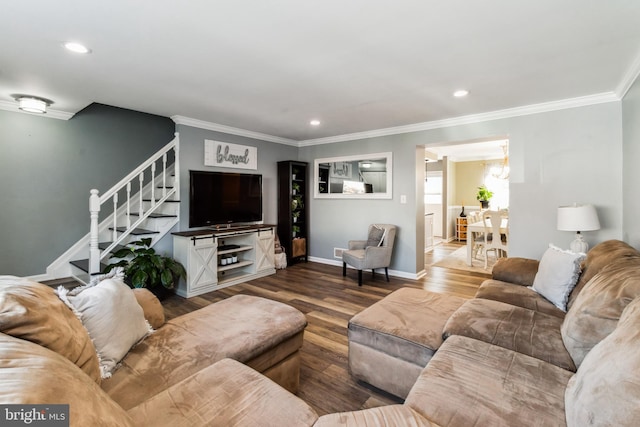 living room with hardwood / wood-style floors and ornamental molding