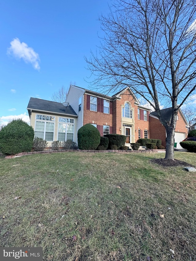 view of front of home with a front lawn