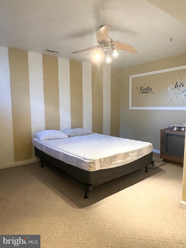 bedroom featuring carpet, ceiling fan, and pool table