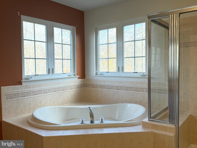 bathroom featuring an enclosed shower