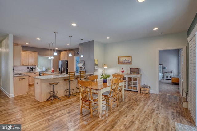 dining room featuring light hardwood / wood-style floors