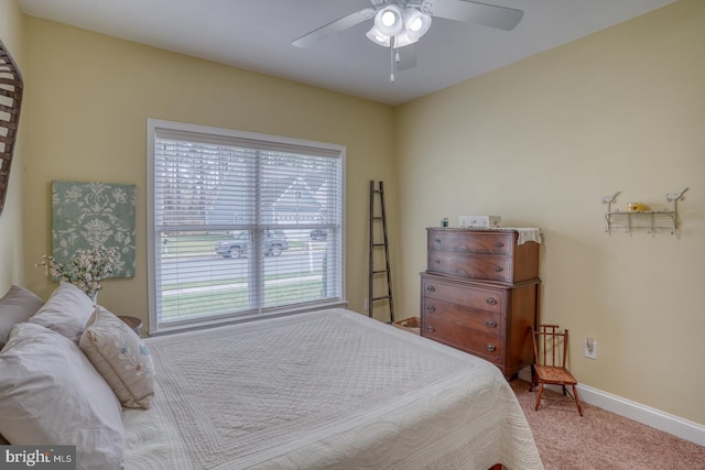 bedroom featuring ceiling fan and carpet floors