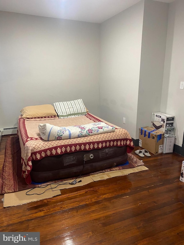 bedroom featuring hardwood / wood-style floors