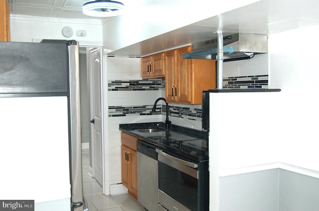 kitchen featuring sink, stainless steel appliances, tasteful backsplash, island range hood, and light tile patterned flooring