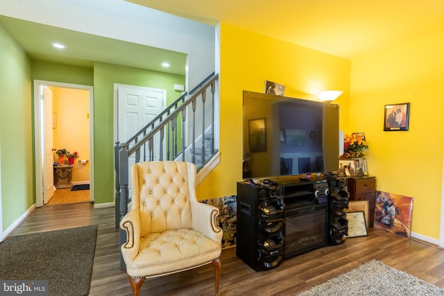 sitting room featuring dark hardwood / wood-style floors