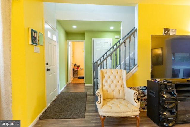 entrance foyer featuring dark hardwood / wood-style flooring