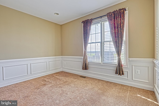 view of carpeted spare room