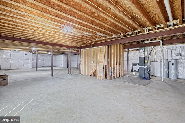 basement featuring electric water heater