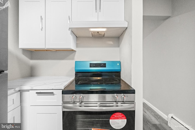 kitchen with white cabinetry, extractor fan, stainless steel range with electric stovetop, and light stone counters