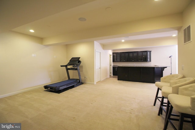 workout room with light carpet