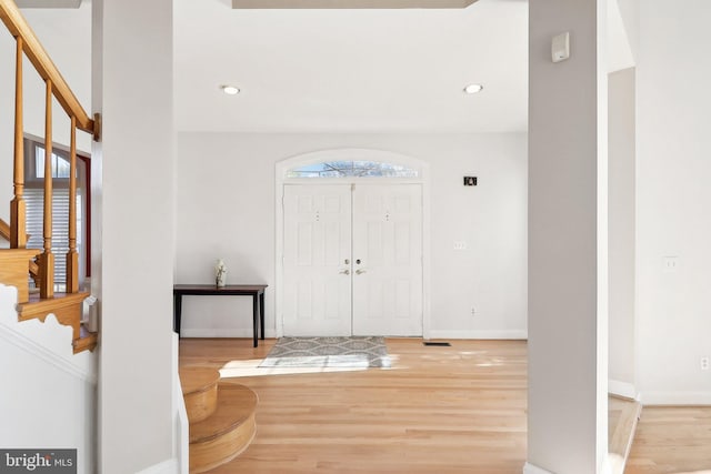 entrance foyer with light wood-type flooring