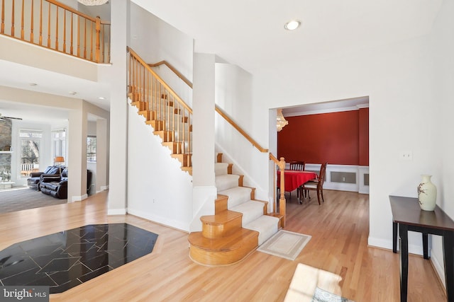 entryway with hardwood / wood-style floors