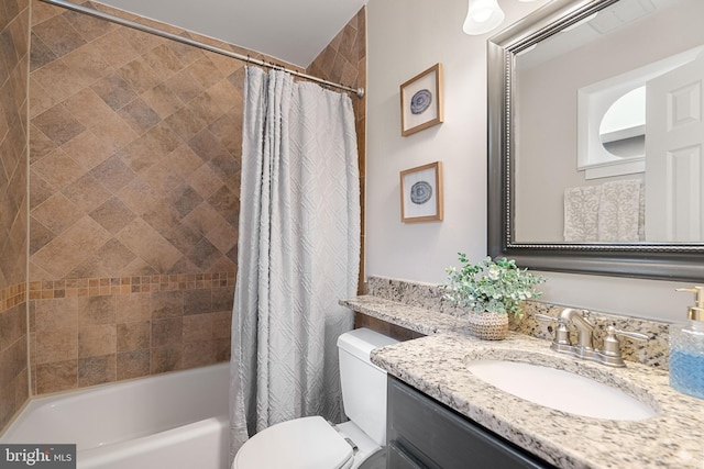 full bathroom featuring vanity, shower / tub combo with curtain, and toilet