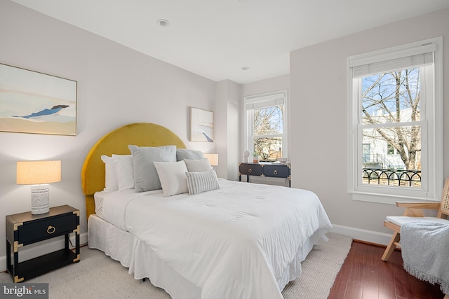 bedroom featuring hardwood / wood-style floors