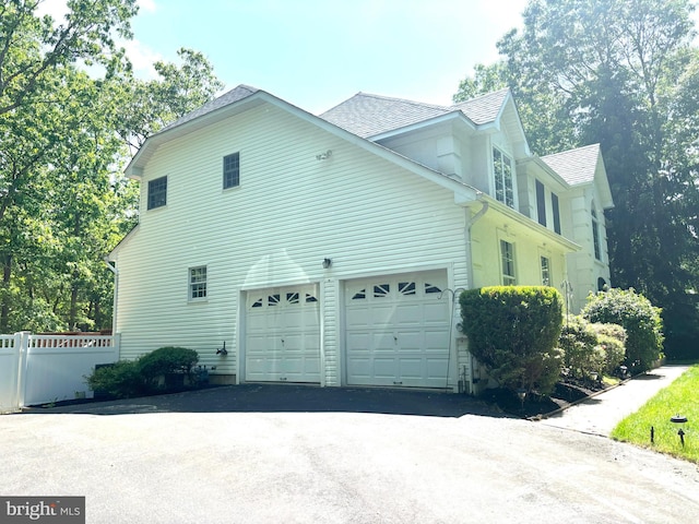 view of home's exterior with a garage