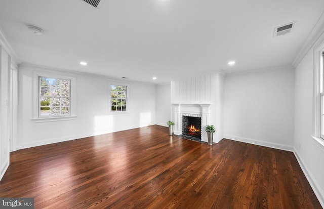 189 Constitution Dr, Princeton, NJ 08540 - unfurnished living room featuring a brick fireplace, wood finished floors, crown molding, recessed lighting, and baseboards