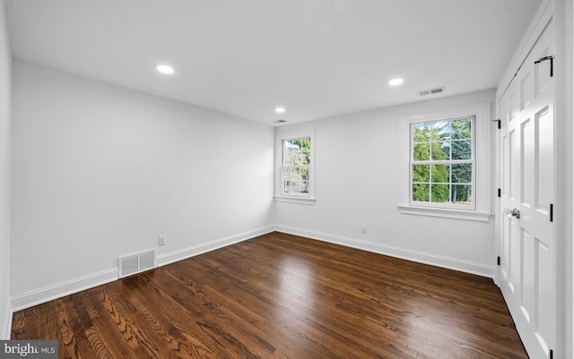 189 Constitution Dr, Princeton, NJ 08540 - unfurnished bedroom featuring baseboards, dark wood-style floors, and recessed lighting