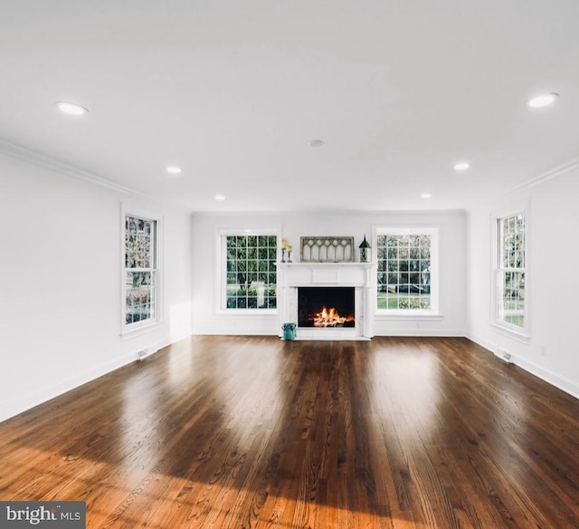 189 Constitution Dr, Princeton, NJ 08540 - unfurnished living room with a lit fireplace, recessed lighting, wood finished floors, ornamental molding, and baseboards