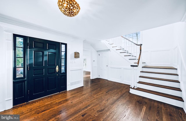 189 Constitution Dr, Princeton, NJ 08540 - foyer entrance with a decorative wall, stairway, wood finished floors, wainscoting, and crown molding